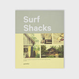 The cover of the Gestalten published book, Surf Shacks, featuring vintage photos of surfboards and homes.