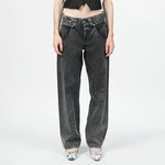 Close half body photo of model wearing the Womens Twisted Seam Jeans - Dark Brown.