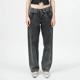 Close half body photo of model wearing the Womens Twisted Seam Jeans - Dark Brown.