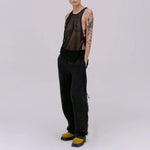 Full body photo of model wearing the mesh UV tank in the color midnight. 
