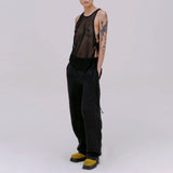 Full body photo of model wearing the mesh UV tank in the color midnight. 