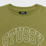 Close detail photo of a oversized stussy crewneck sweatshirt in a light green color.