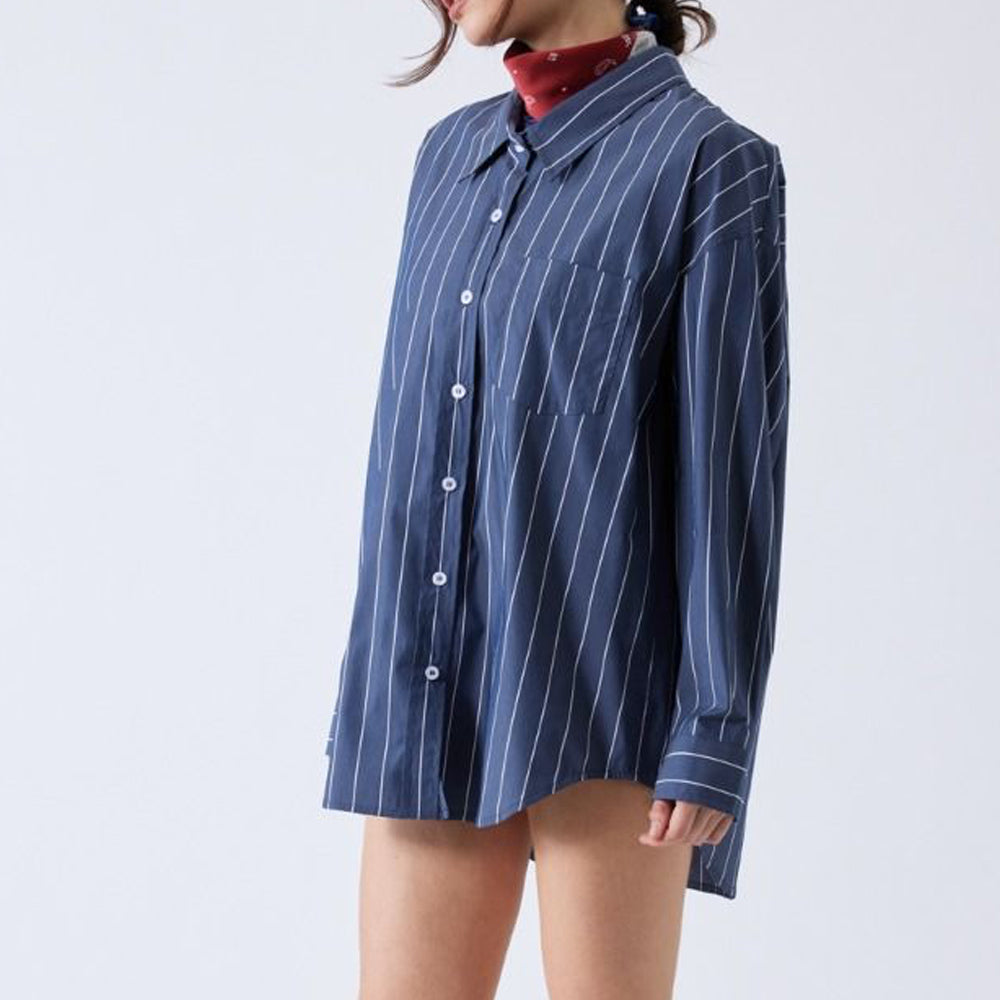 Close half body photo of the model wearing the Wide Striped Oversized Shirt - Dark Grey.