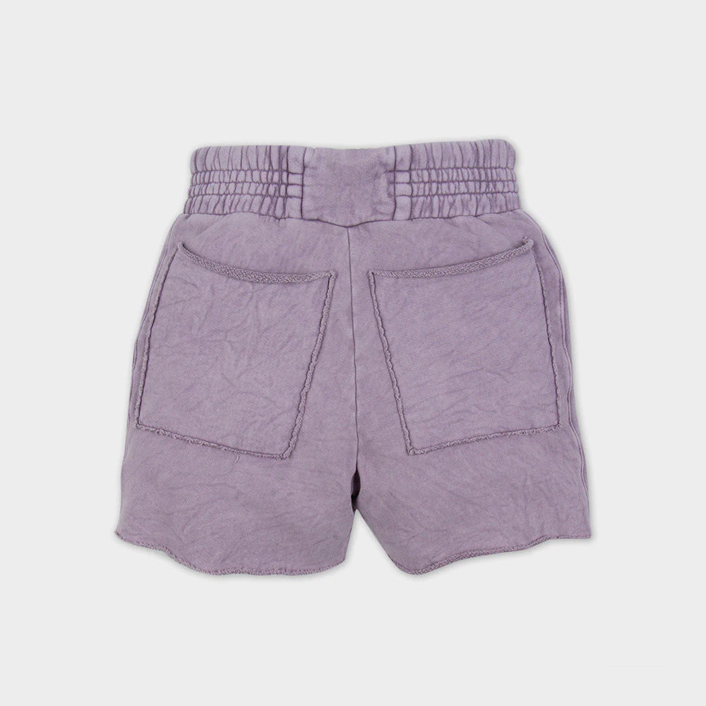 A back photo of Les Tien's Yacht Short, a unisex cotton short with wide elastic waistband, side pockets, and long white waist drawstring in a light heathered lavender color.