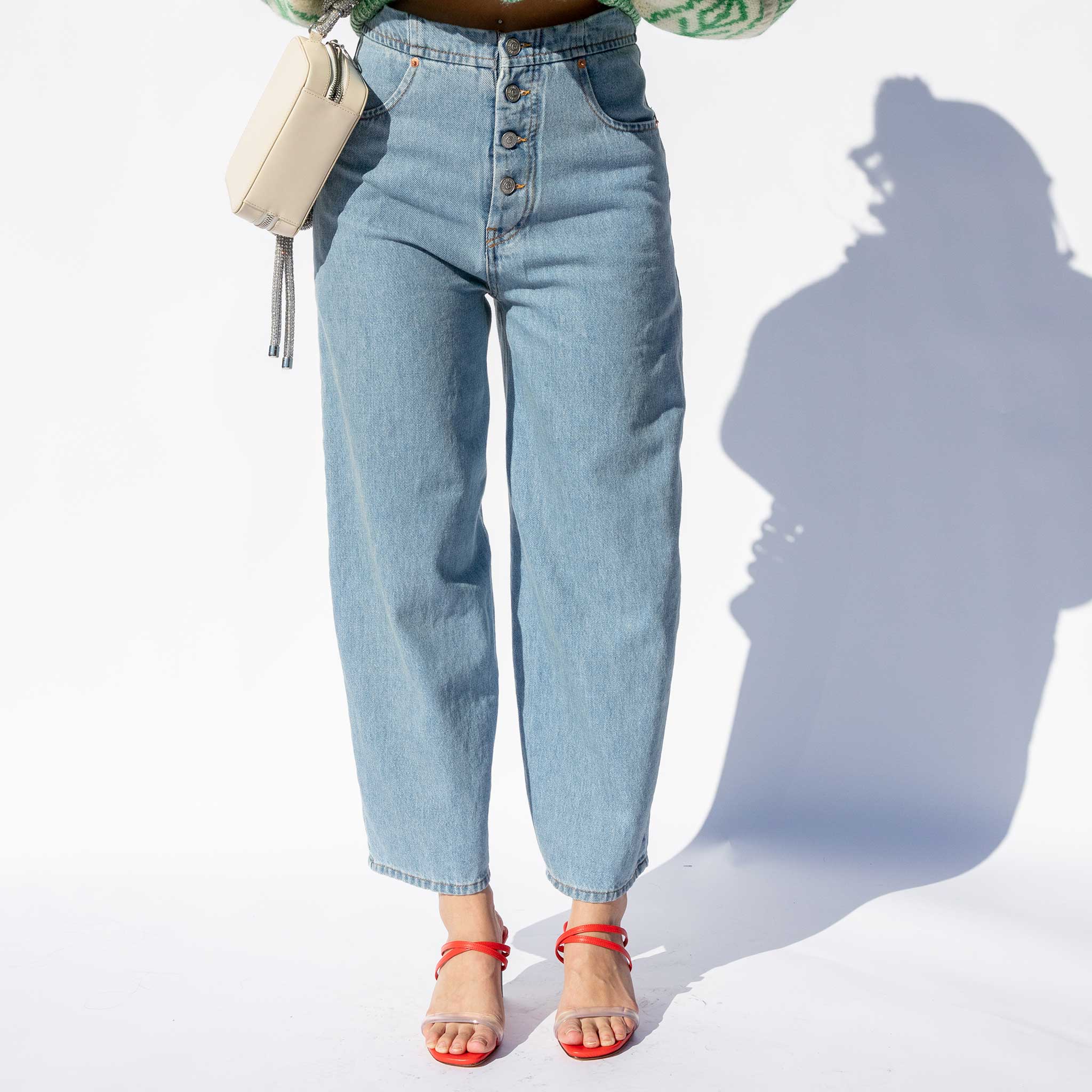 Close half body photo of model wearing the 5 Pocket Jeans - Light Blue.