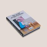 Photo of book cover for The World of Apartamento, showing a large Baldessari print leaned against a living room wall with a white sofa and parquet floors.