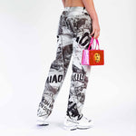 Back half body photo of model wearing the Atlas Pant - Easy Rider.