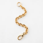 Close flat photo of model wearing the Cable Bracelet.