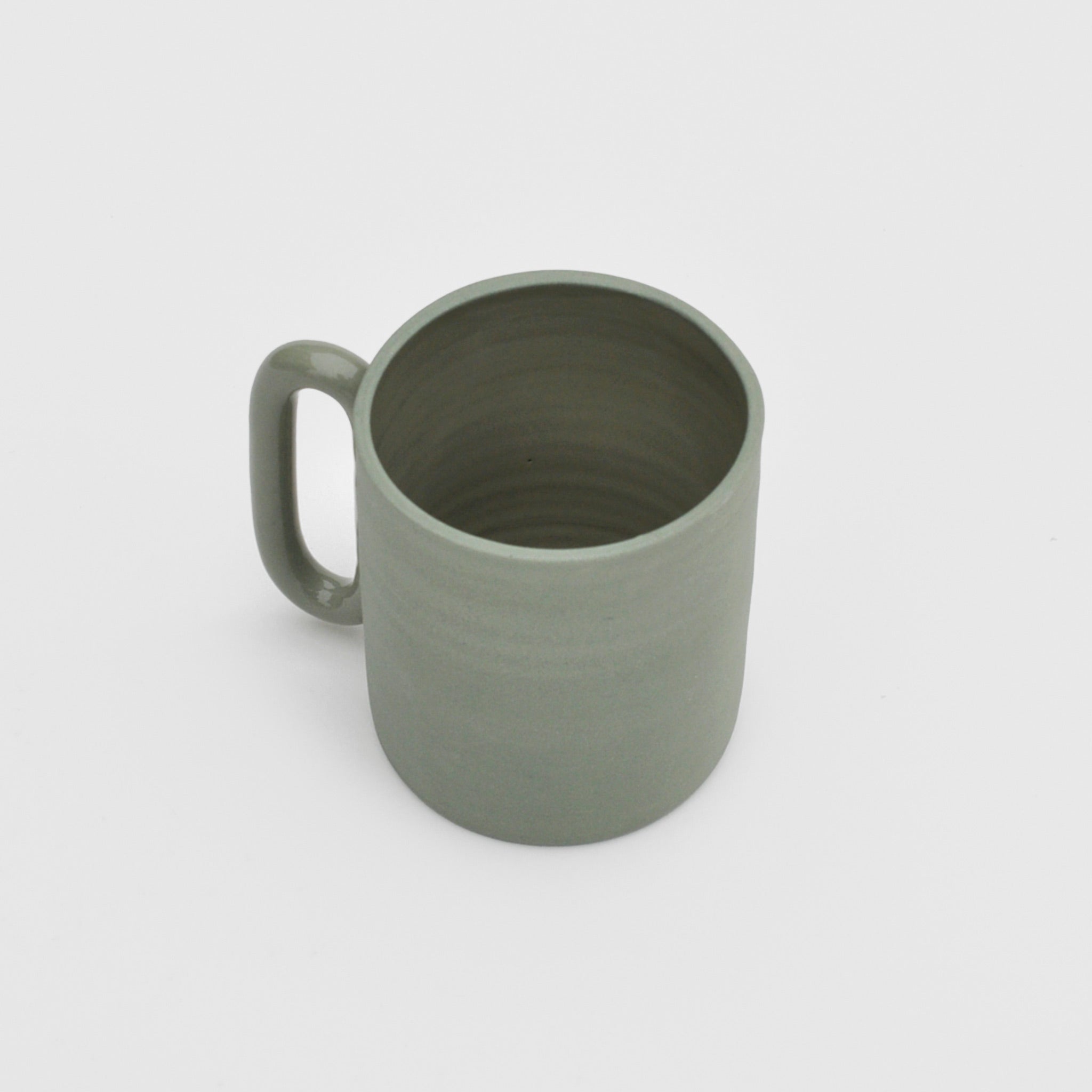Above image of the capsule mug in celadon by Ekua Ceramics.
