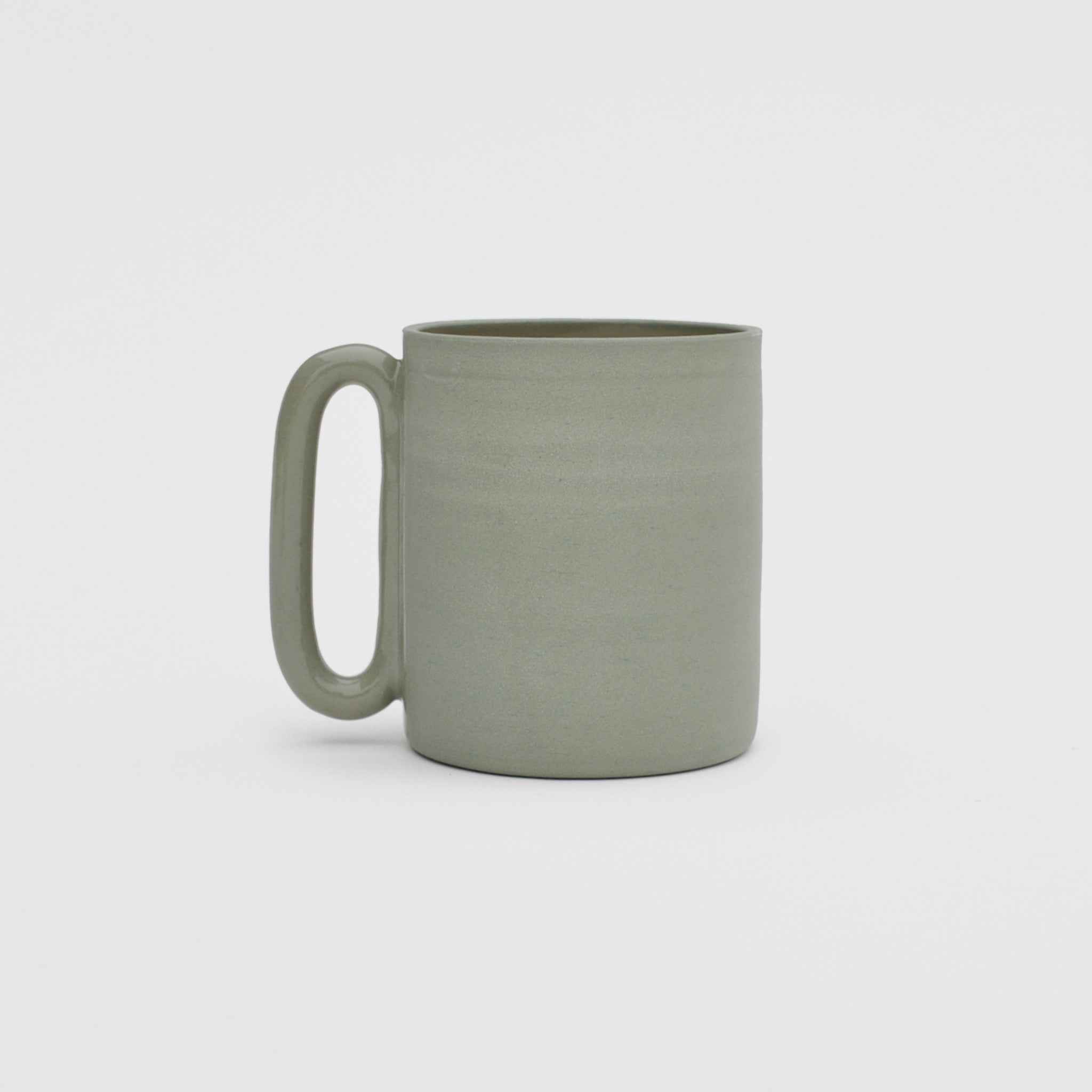 Flat image of the capsule mug in celadon by Ekua Ceramics.