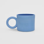 Flat image of the circle mug in blue by Ekua Ceramics.