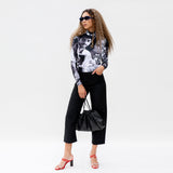 Full body photo of model wearing the Colette High Neck Top - Romantic B&W.