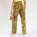 Back view of a model wearing the unisex Aries Crinkle Camo Walking Trouser.
