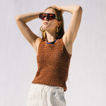 Close half body photo of model wearing the Dance Crochet Vest.