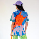 Back half body photo of model wearing the Deep Sea Marpi Tee.