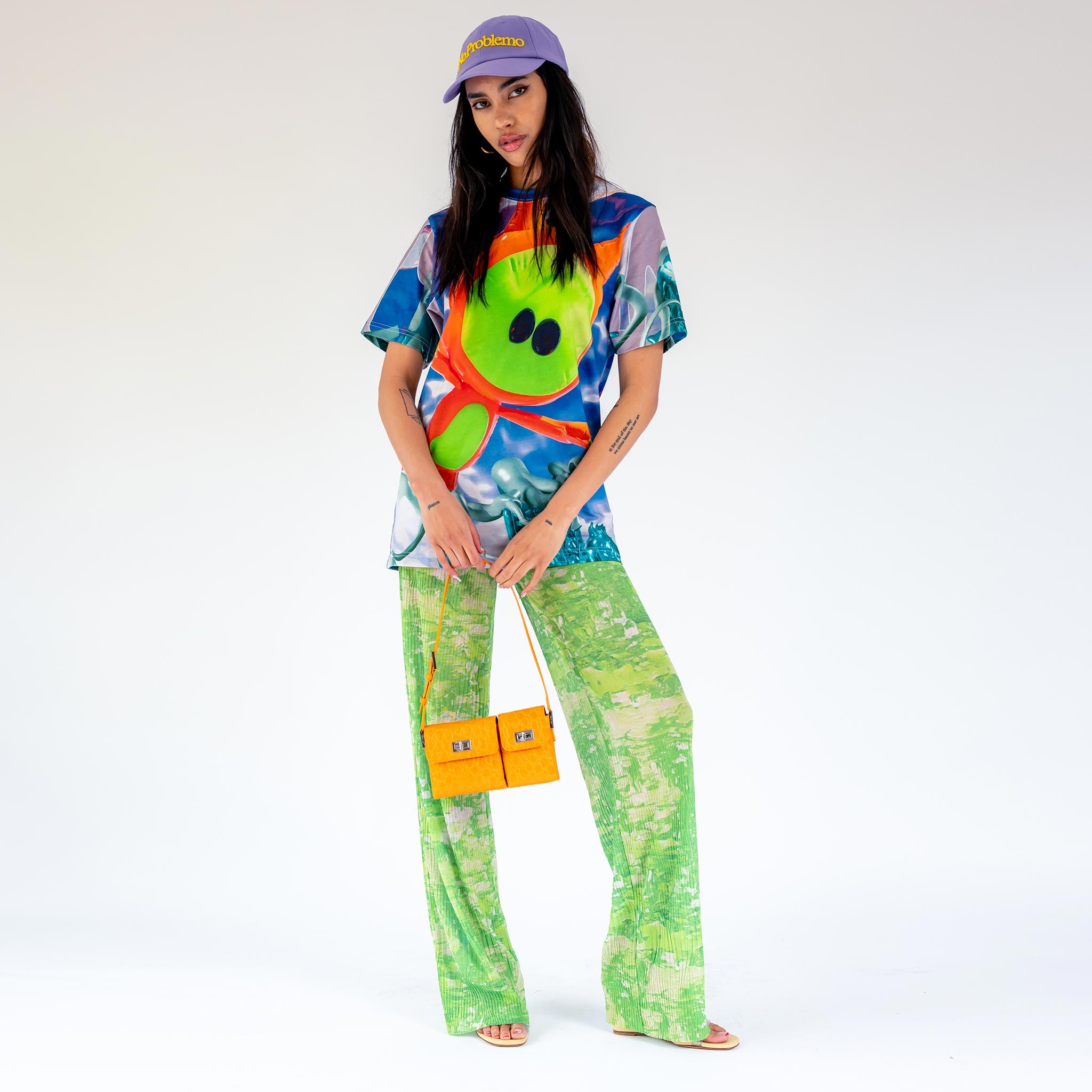 Full body photo of model wearing the Deep Sea Marpi Tee.
