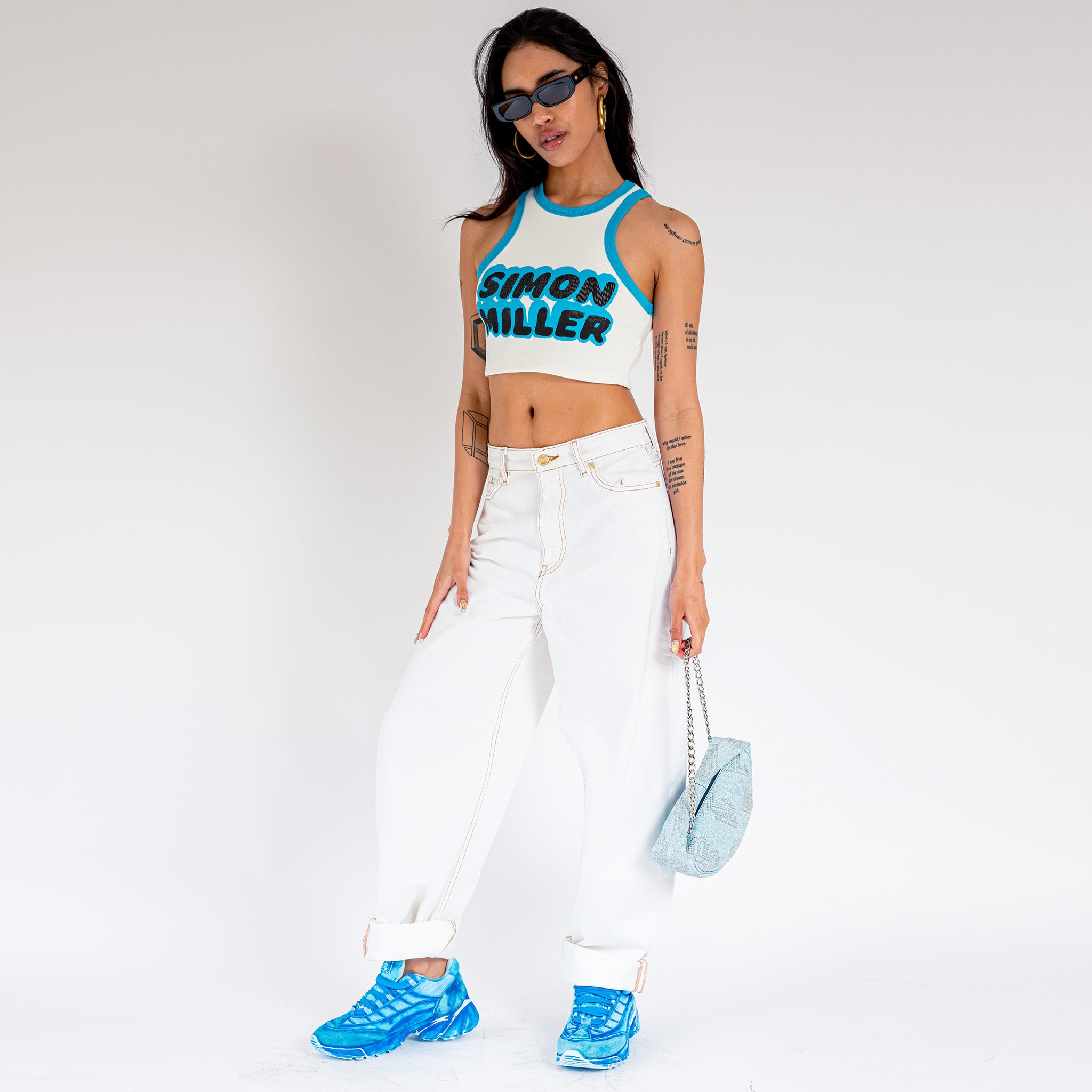 Full body photo of model wearing the Dimmy Tank - White.