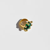 Side image of the diva ring in emerald by Mondo Mondo.