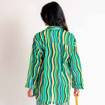 Back half body photo of model wearing the Dodo Shirt - Blue Stripe.