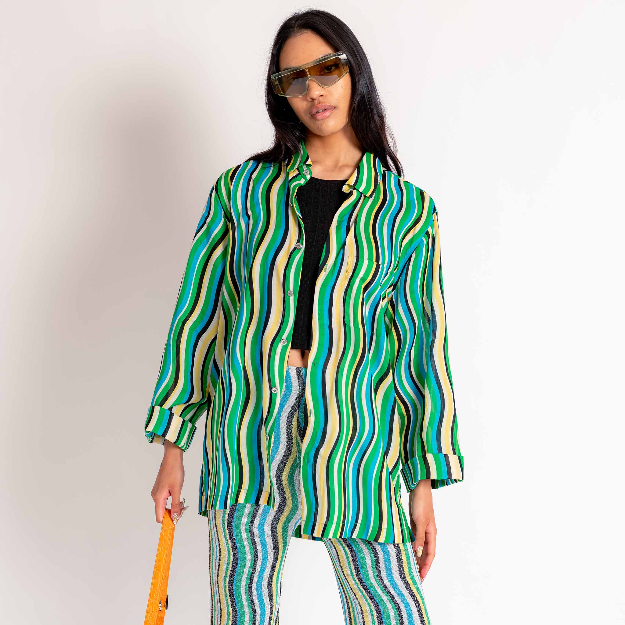 Close half body photo of model wearing the Dodo Shirt - Blue Stripe.