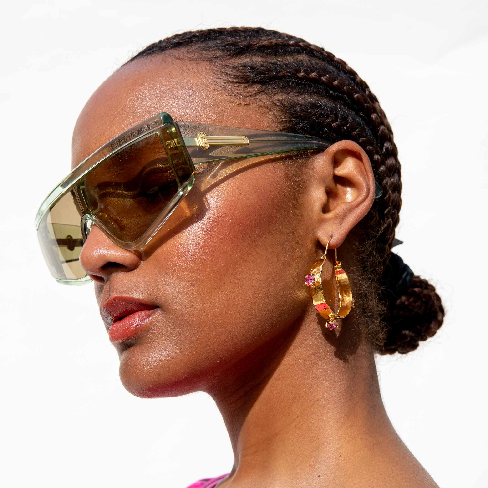 Close detail photo of model wearing the Esprit Hoop II. 