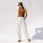 Full body photo of model wearing the Eternal Trousers - Ivory.
