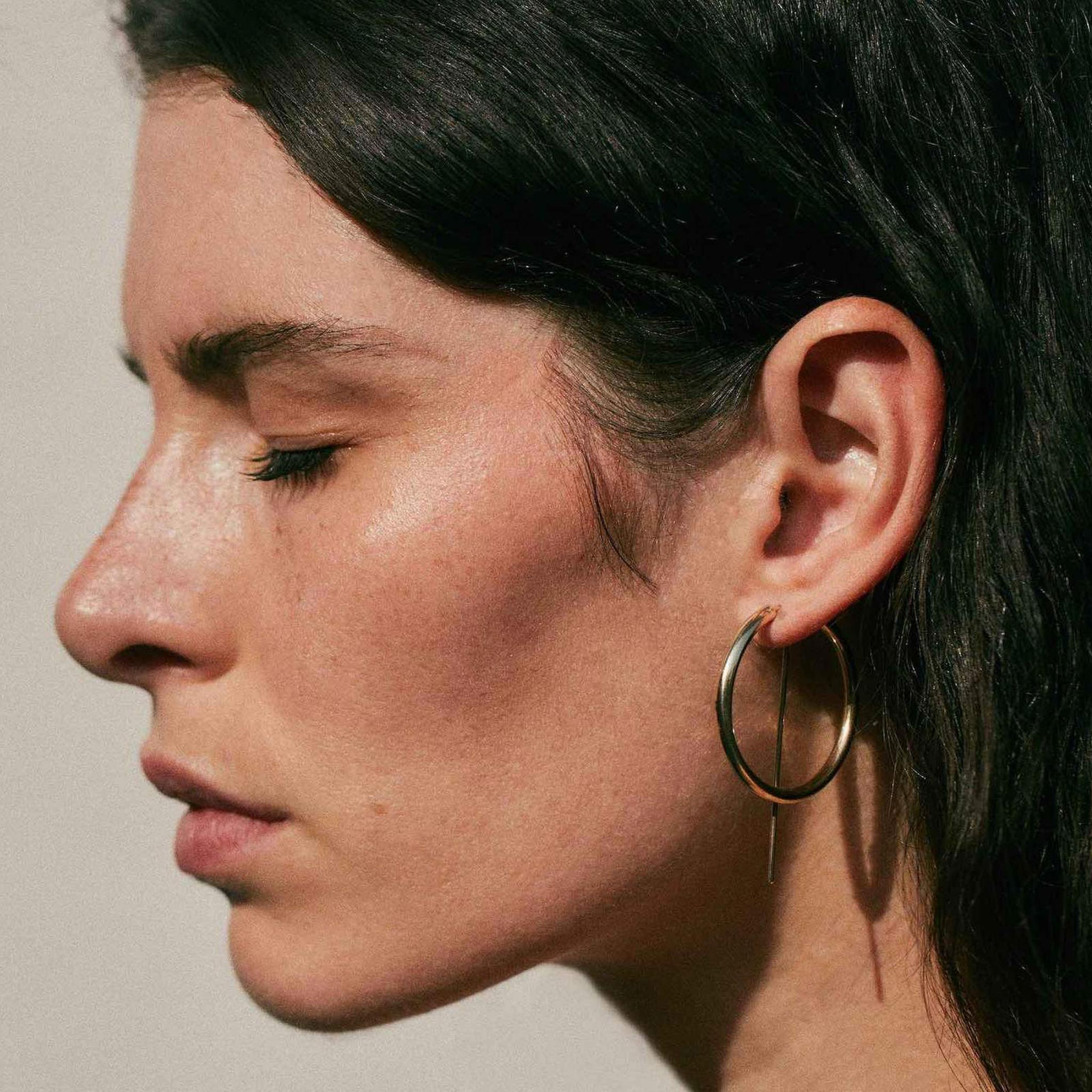 Jaclyn Moran Jewelry - Hoop & Post Earrings in Yellow Gold, pictured on model.