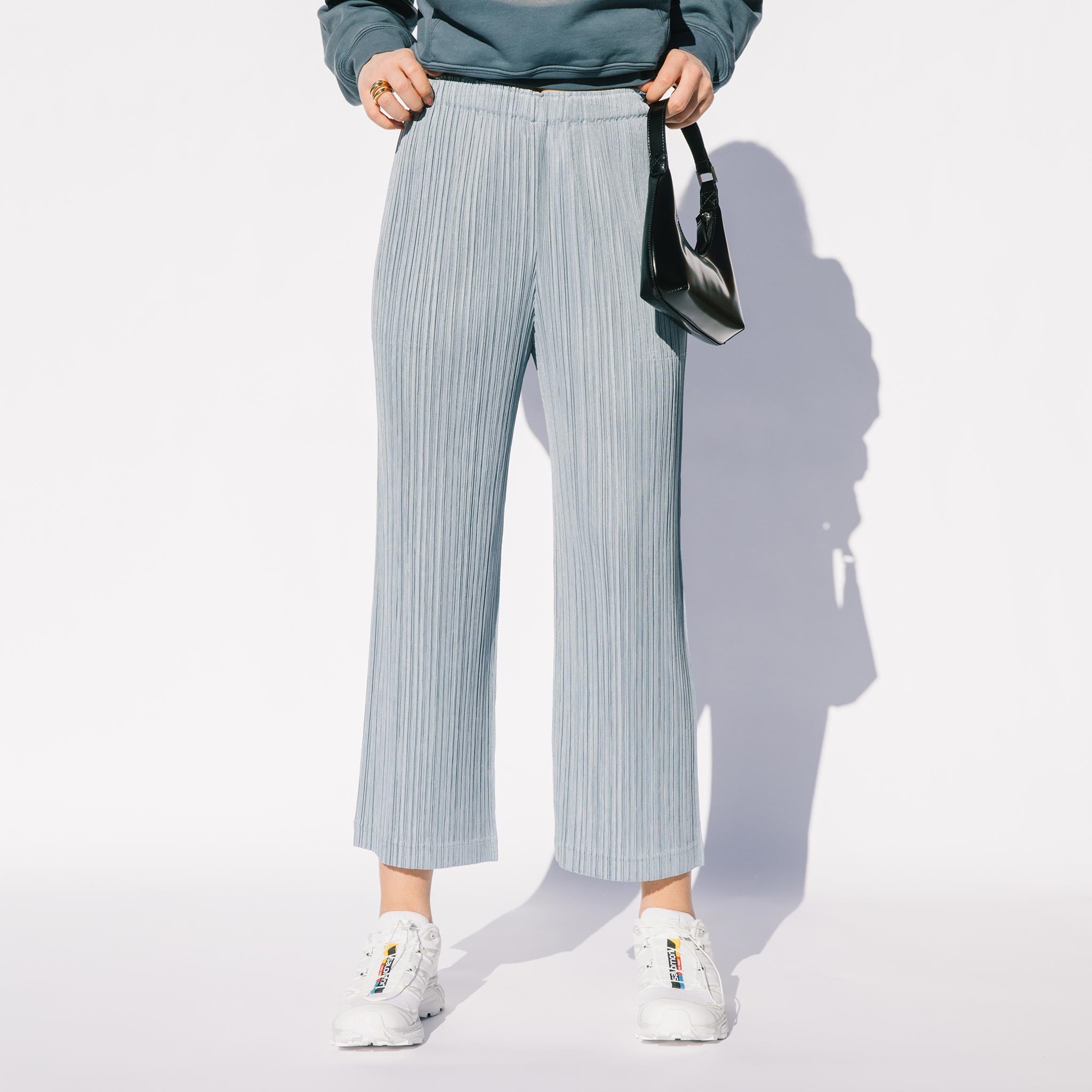 Close half body photo of model wearing the Jan Thicker Bottoms - Blue Grey.
