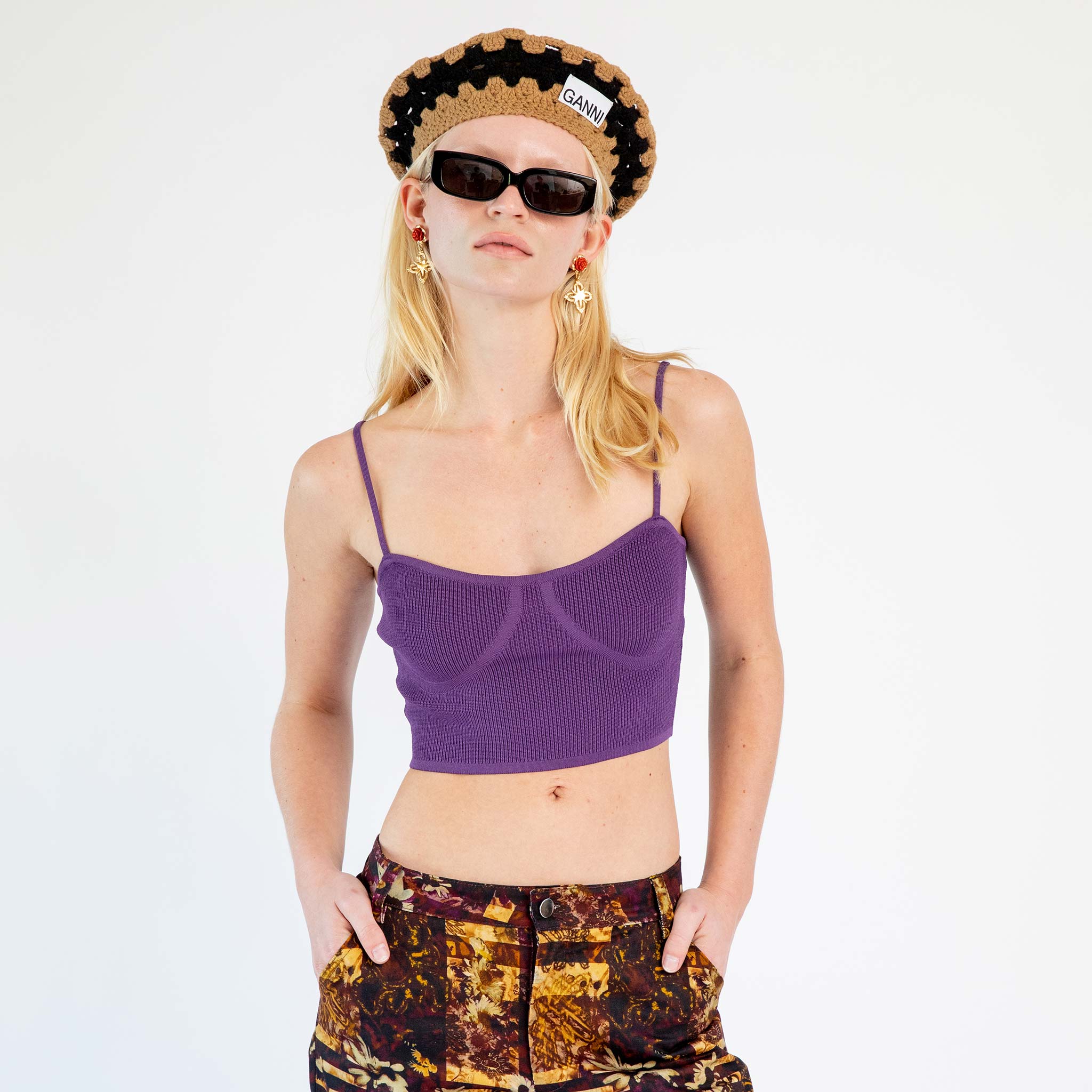 Close half body photo of model wearing the Knit Bra Top - Purple.