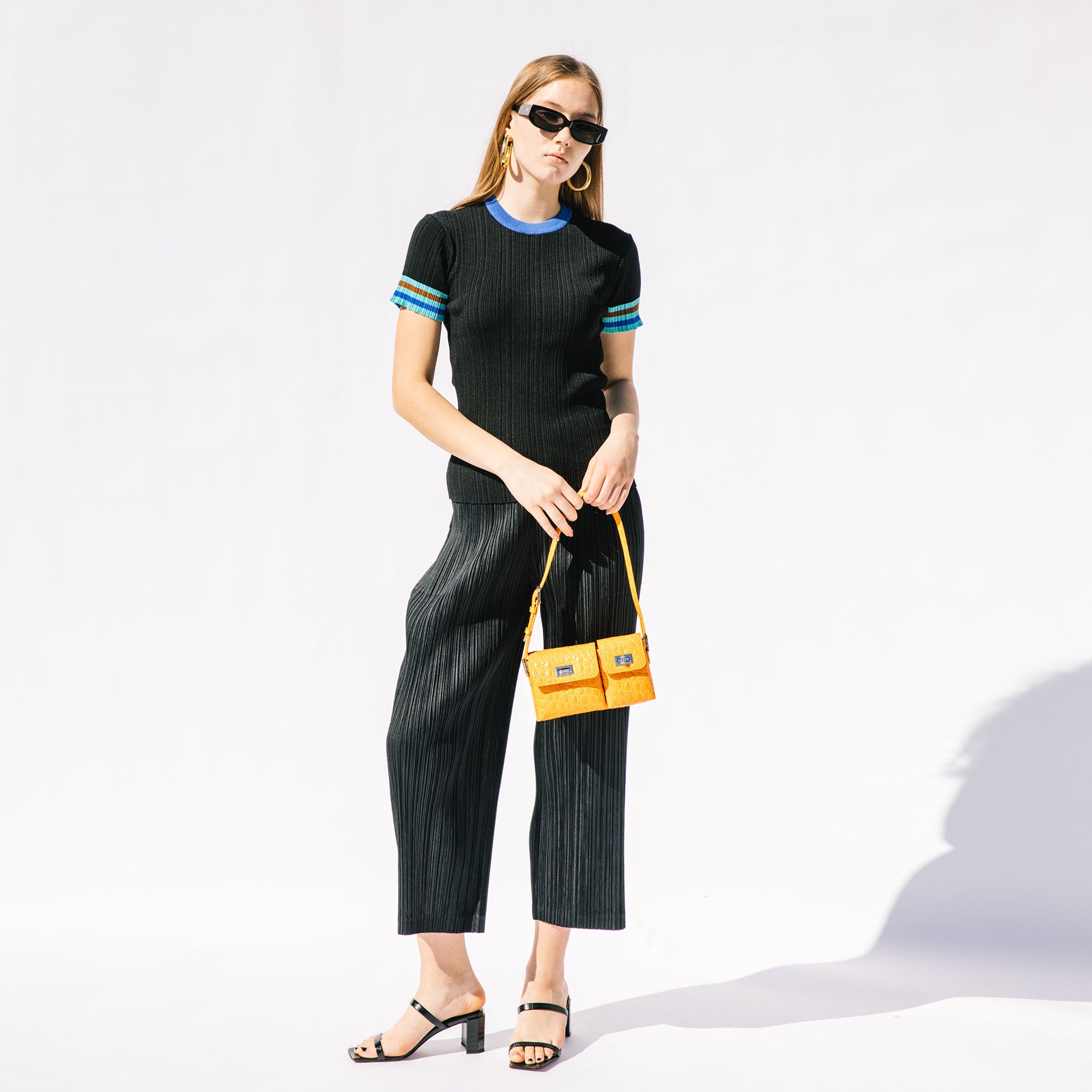 Full body photo of model wearing the Knit Top.