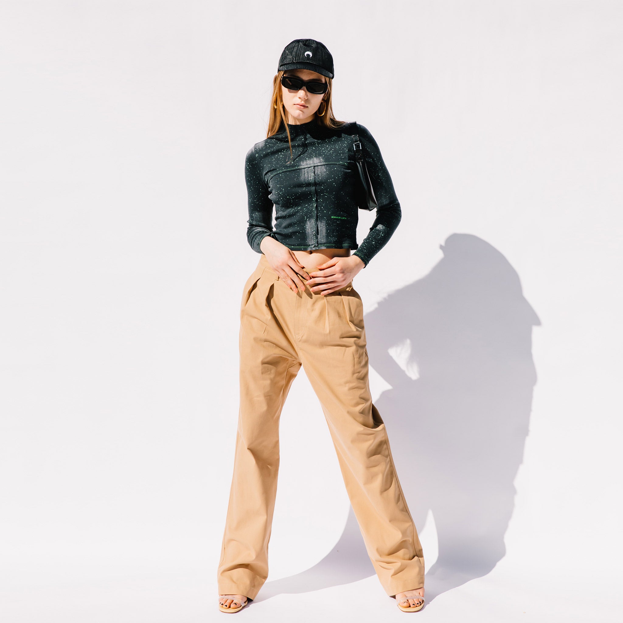 Full body photo of model wearing the Lapped Baby Tee - Laser .
