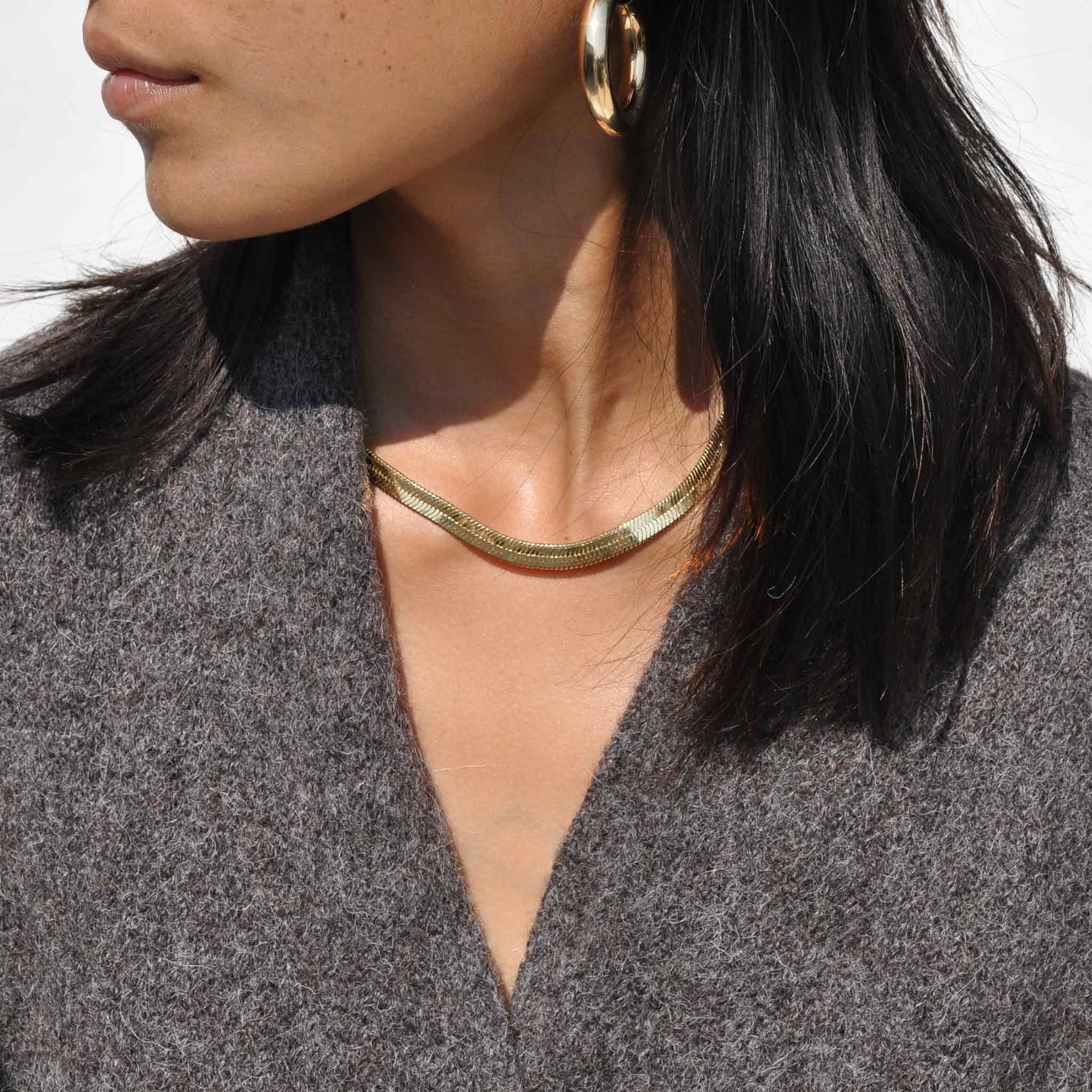 Image of Laura Lombardi Omega Chain on a model.
