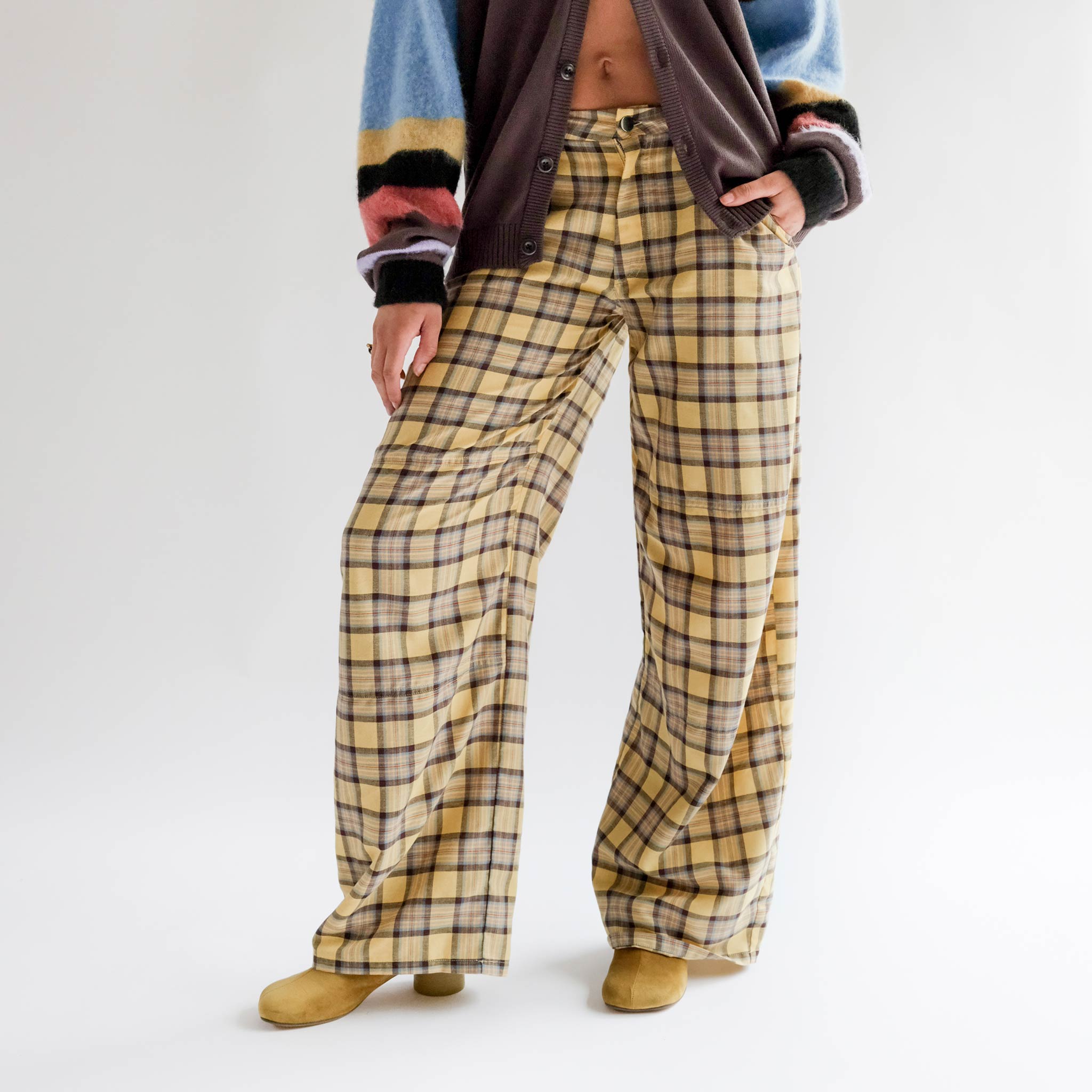 Close half body photo of model wearing the Lawn Pant - Mall Plaid.