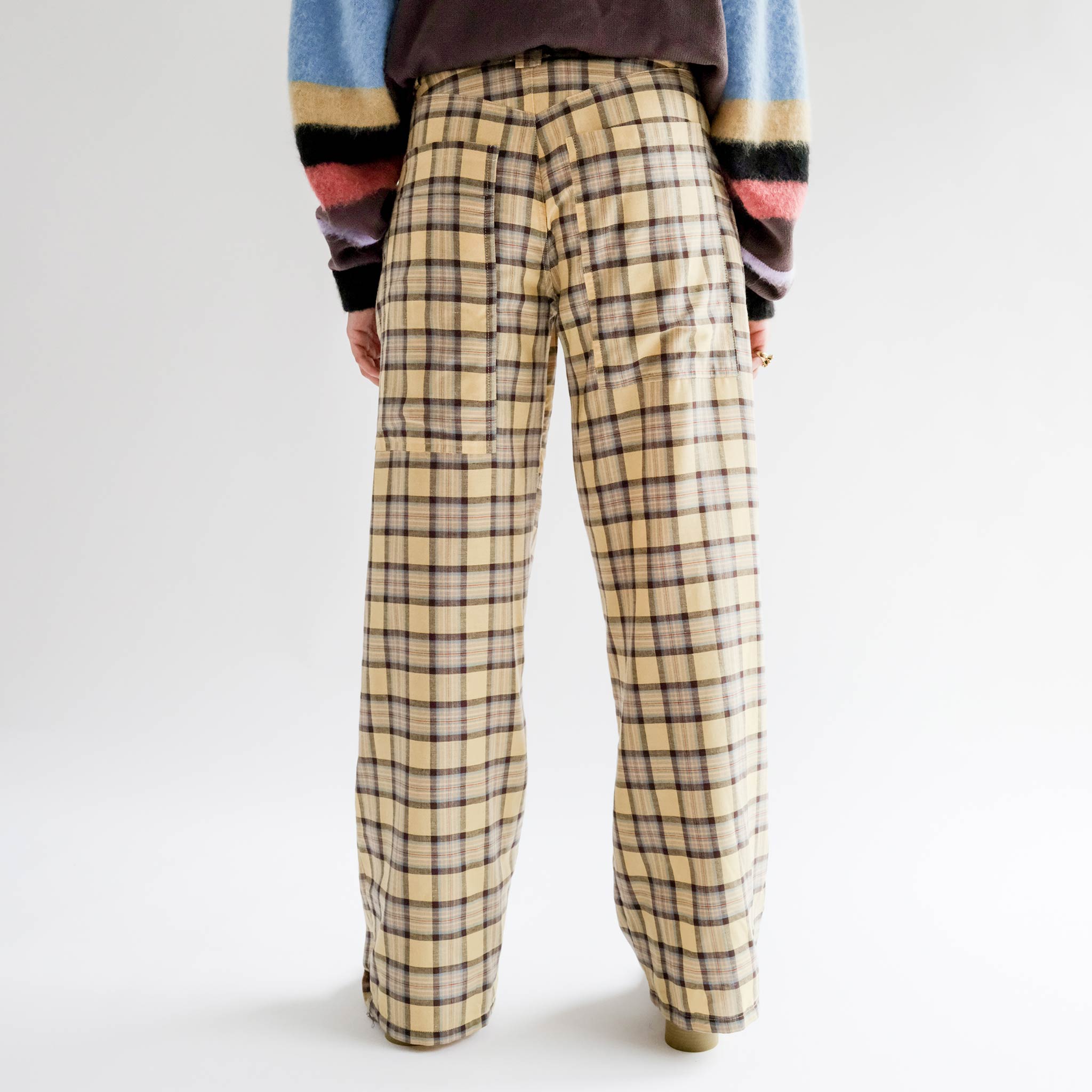 Half body photo of model wearing the Lawn Pant - Mall Plaid.