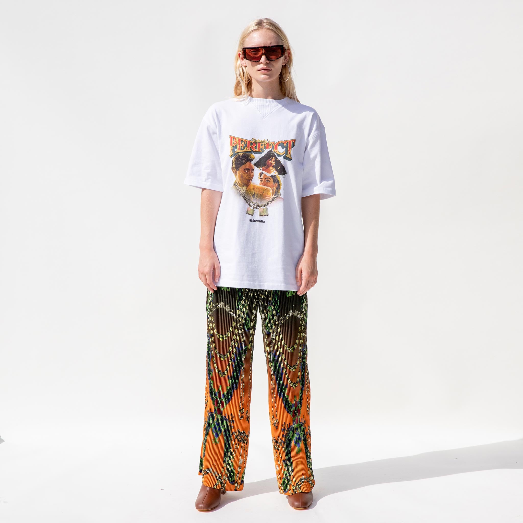 Full body photo of model wearing the Link Tee - White.