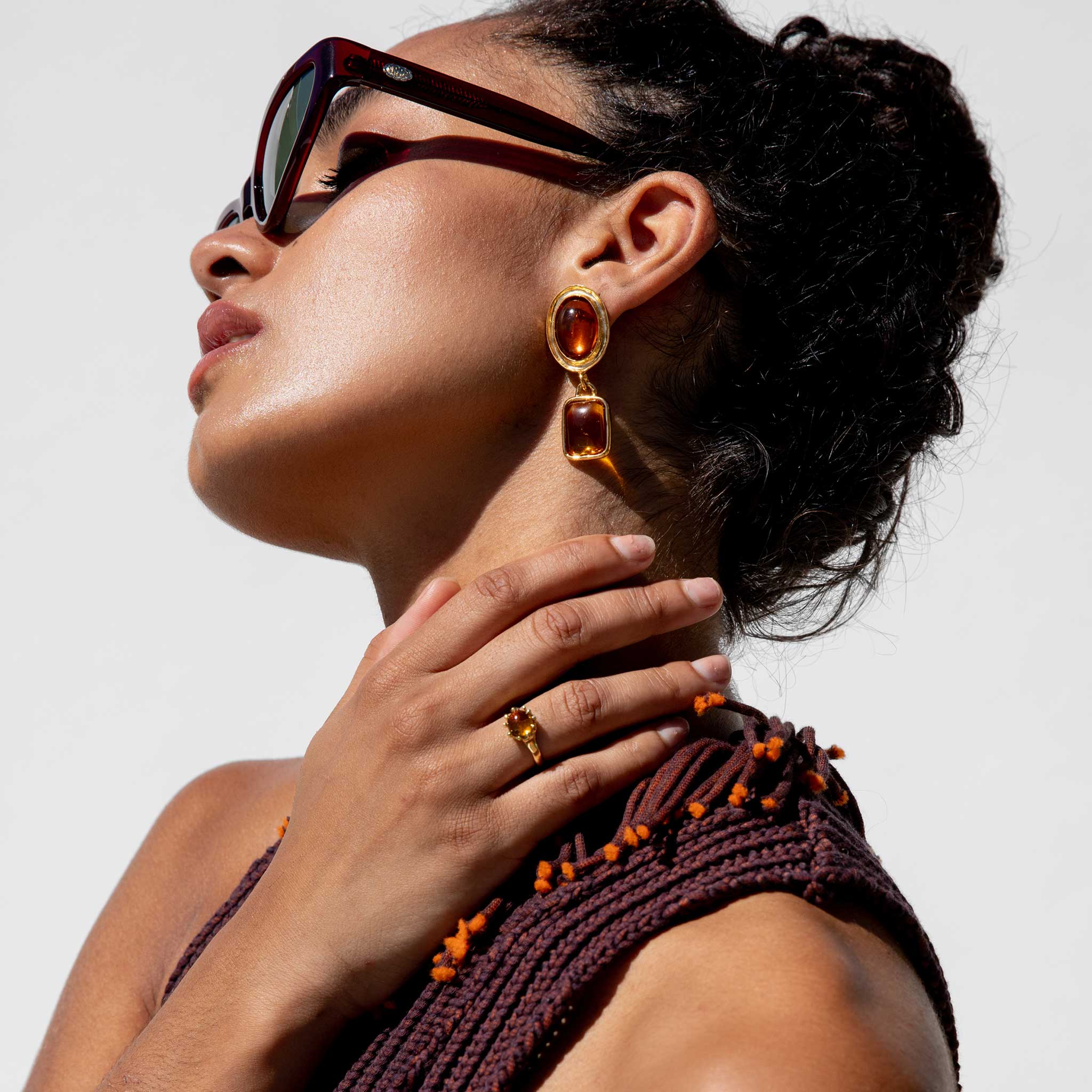 Close detail photo of model wearing the Lush Ring - Yellow.