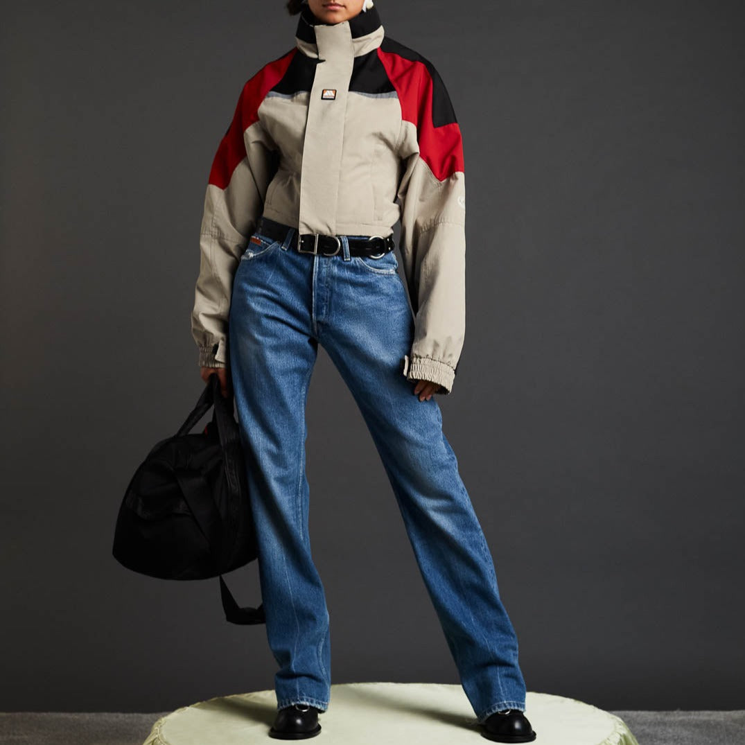 Full body photo of model wearing the Shrunken Sports Jacket - Red/Black/Beige.