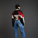 Back full body photo of model wearing the Shrunken Sports Jacket - Red/Black/Beige.
