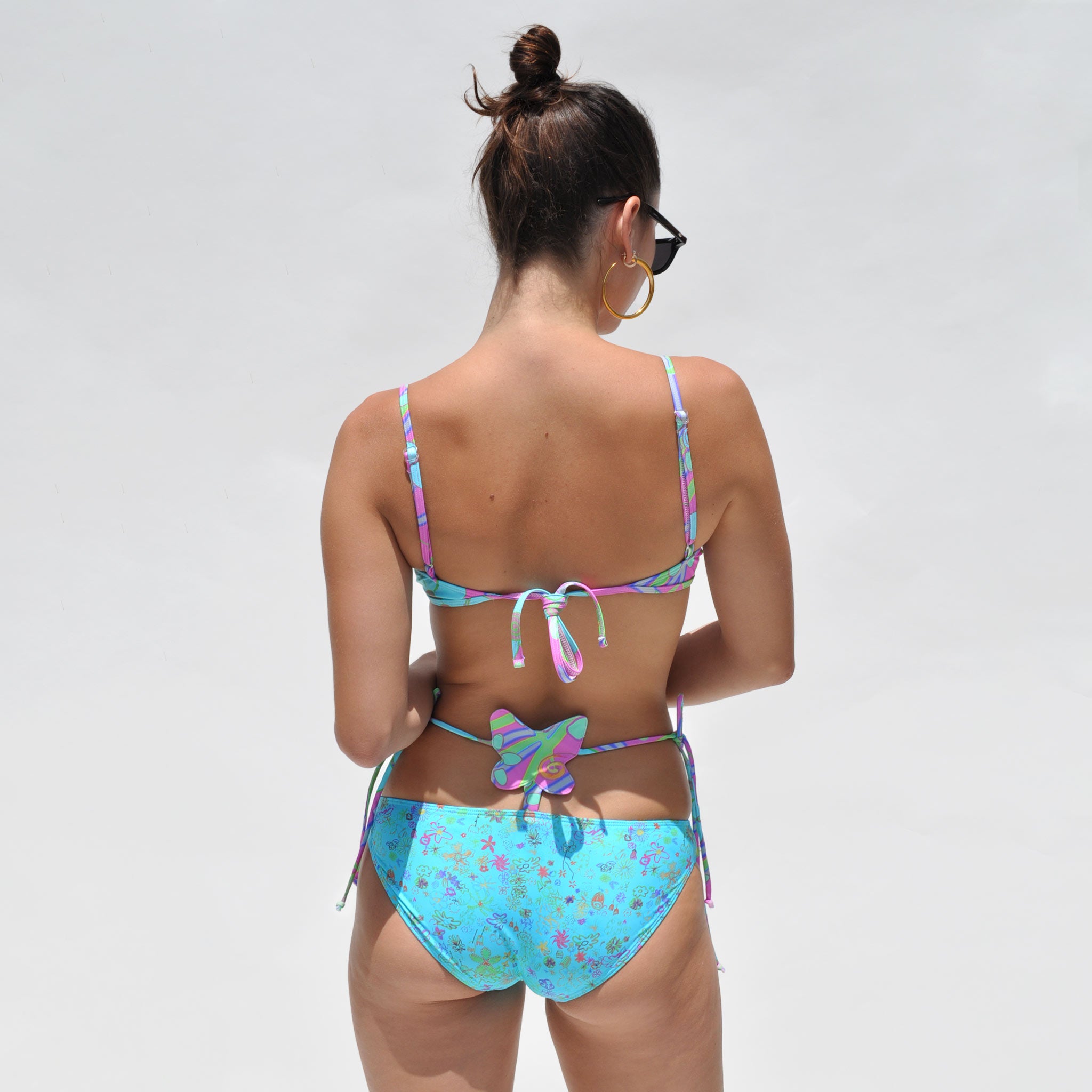 Back detail photo of model wearing the Mariposa Bikini