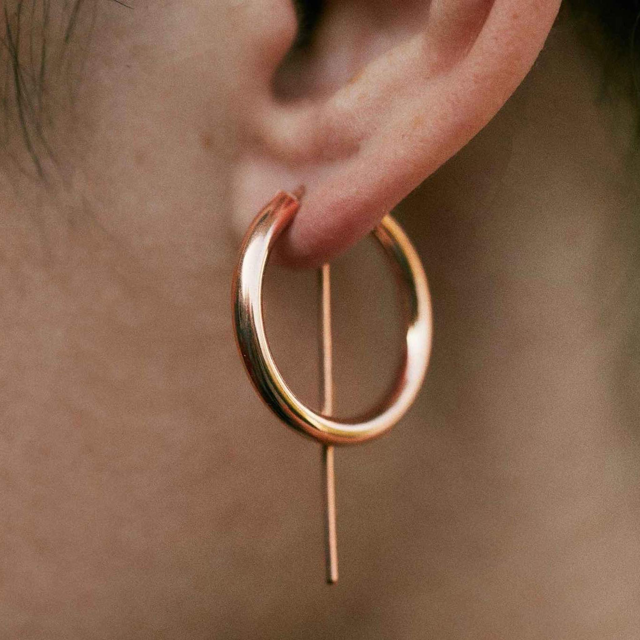Jaclyn Moran - Mini Hoop & Post Earring in Rose Gold, pictured on model.