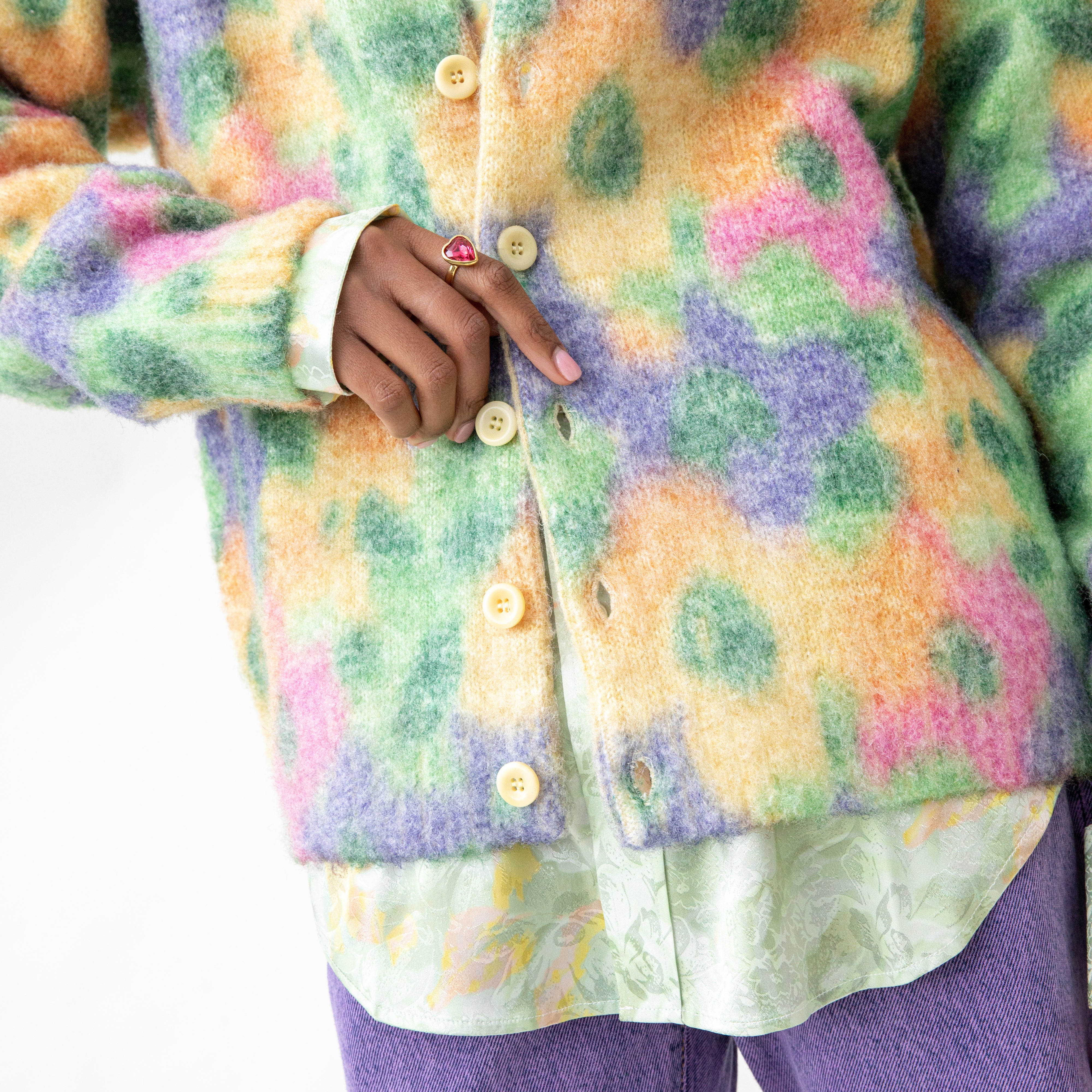 Close detail photo of model wearing the Mohair Floral Printed Cardigan - Mustard Multi.