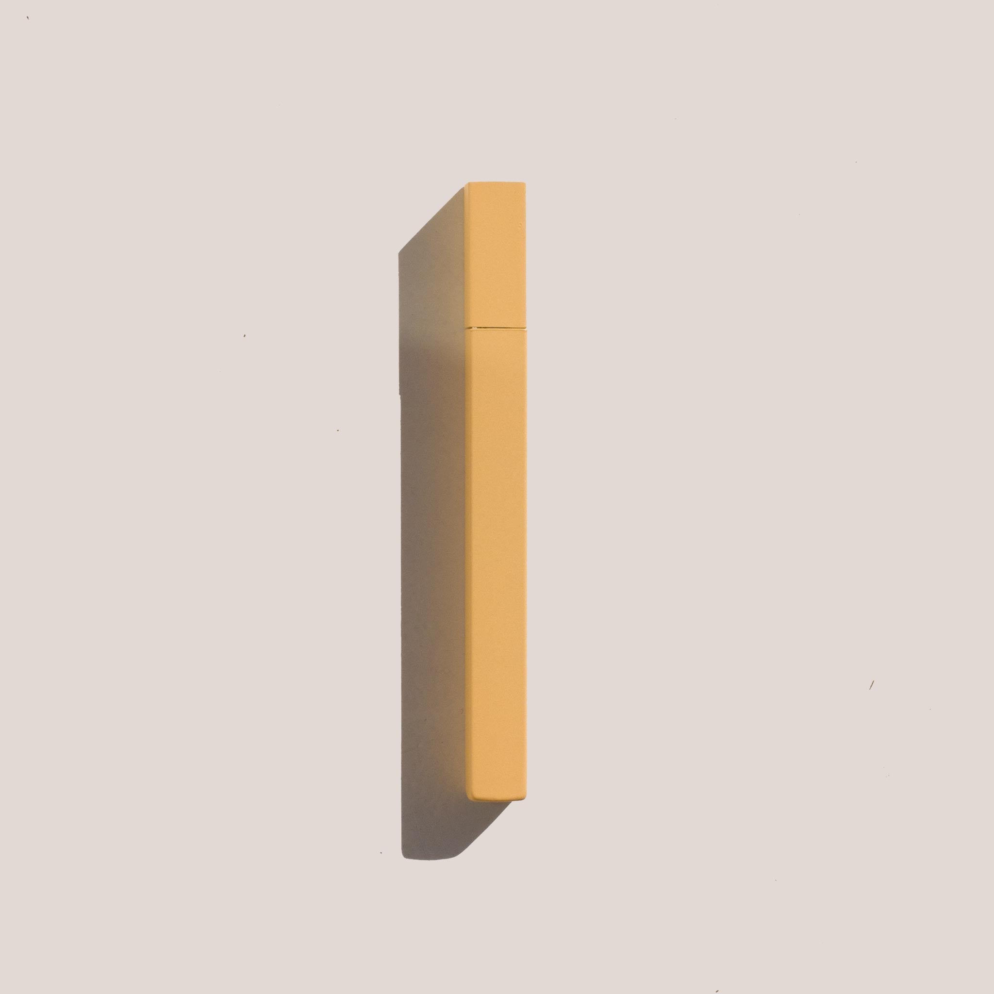 Tsubota Pearl - Mono Queue Stick Lighter in Egg Yellow.