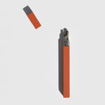 Flat image of the mono stick lighter LCD with the lighter cap open, exclusively ours in terracotta.