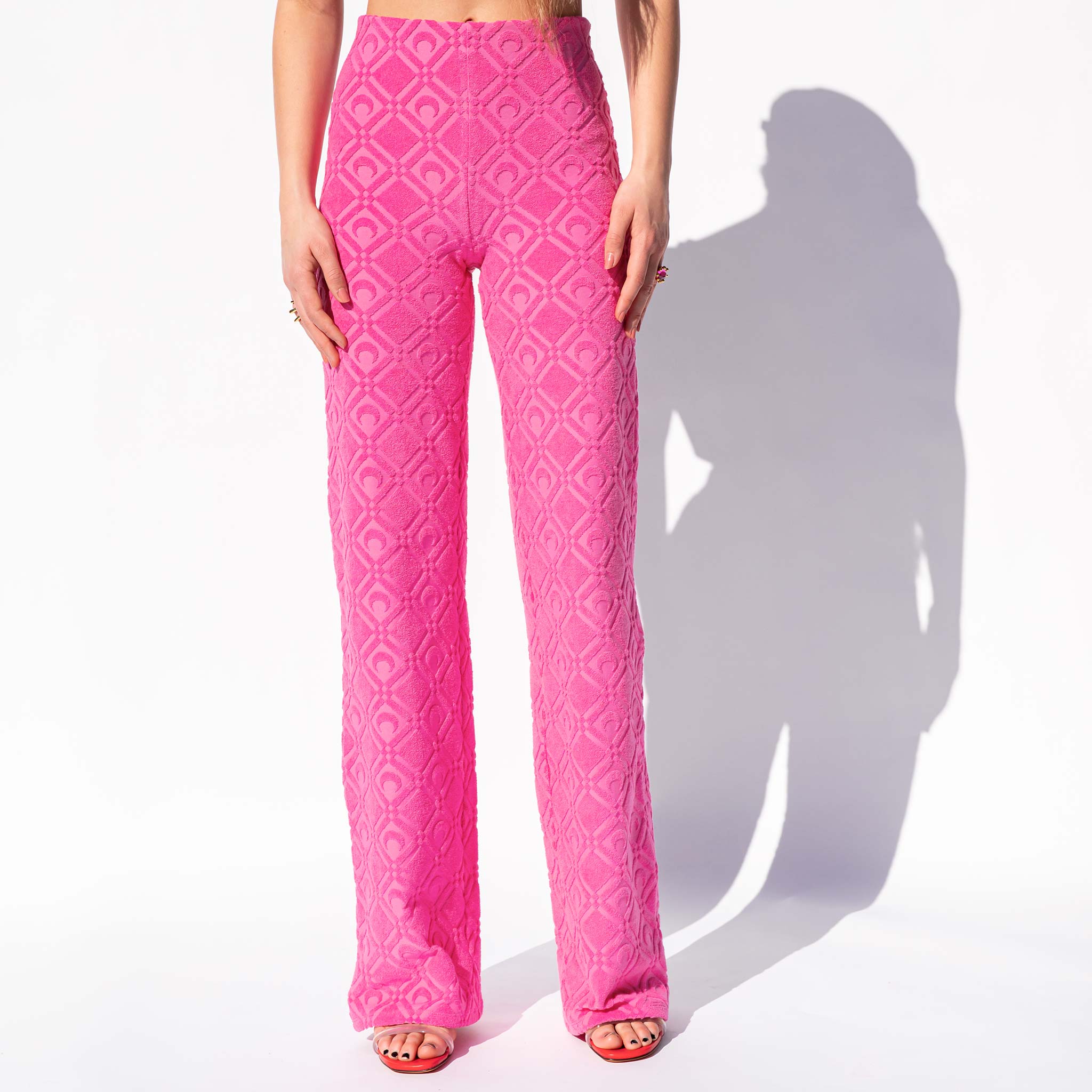 Close half body photo of model wearing the Moon Sponge Jacquard Lounge Pants - Fuchsia.