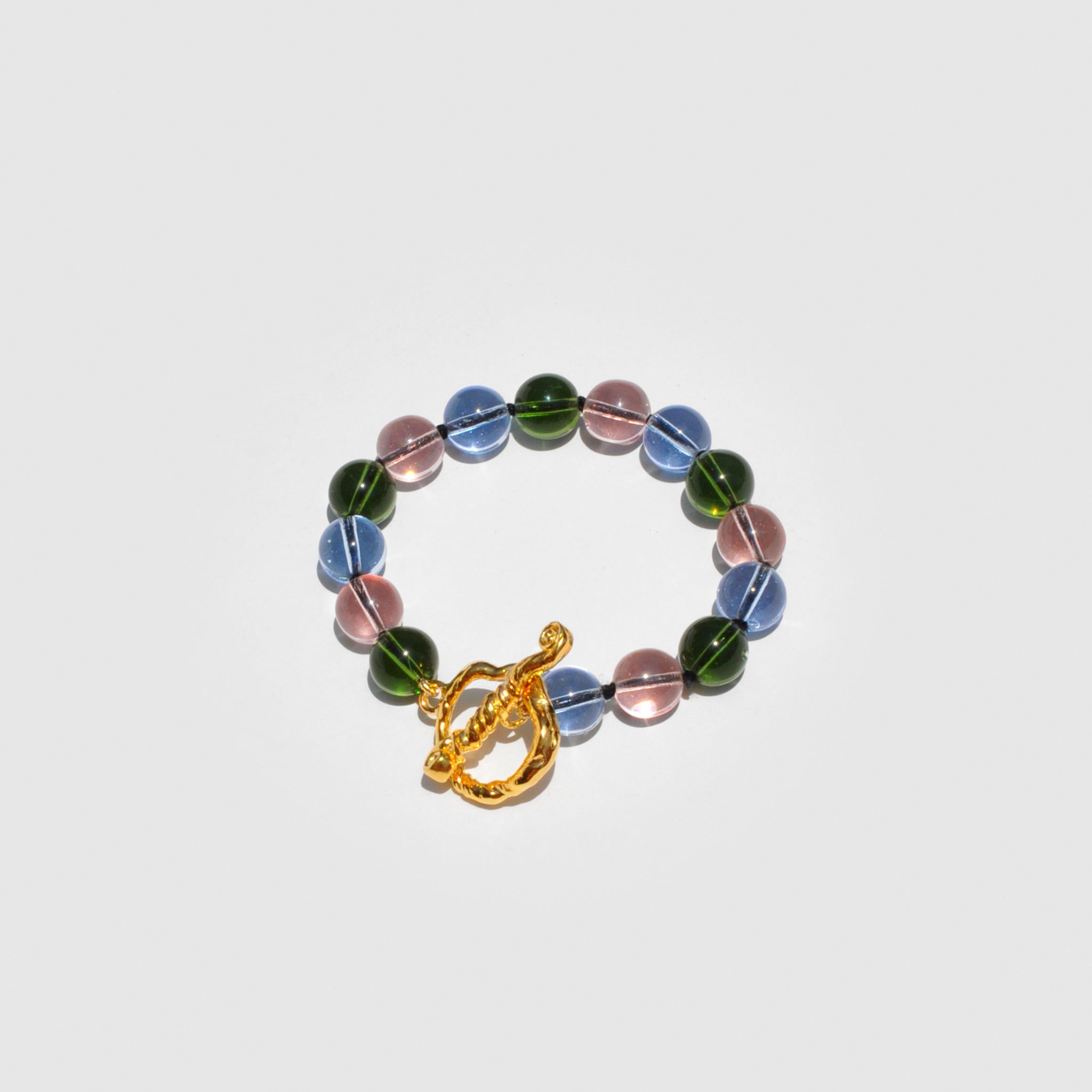 Nan Bracelet - Multi Glass from mondo mondo available at LCD. pink, blue, and green beaded bracelet with gold clasp.