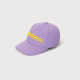 Side photo of the No Problemo Cap in lilac purple with yellow embroidery.
