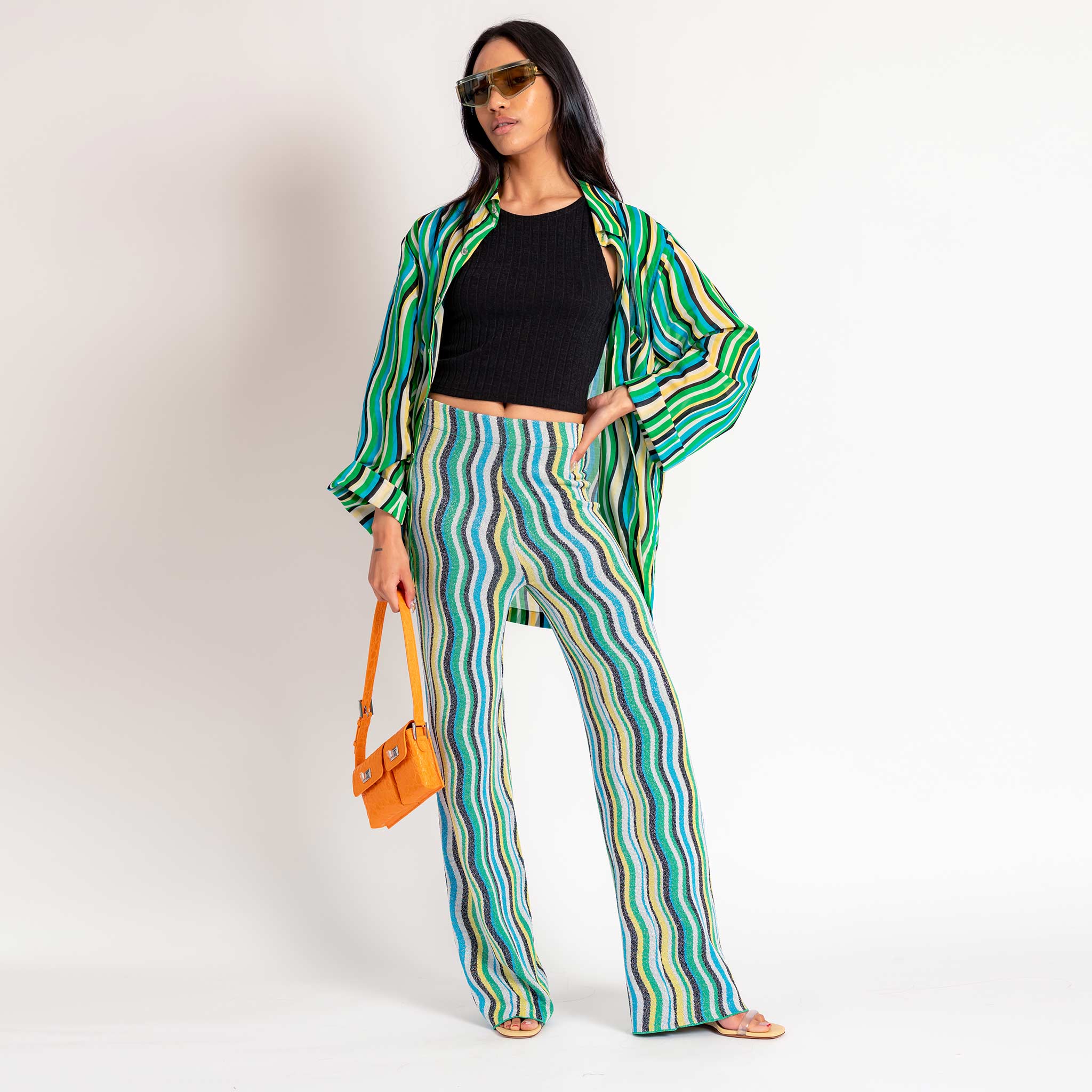 Full body photo of model wearing the Nova Pant - Blue.