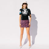 Full body photo of model wearing the Oriental Towels Mini Skirt - Fuchsia.