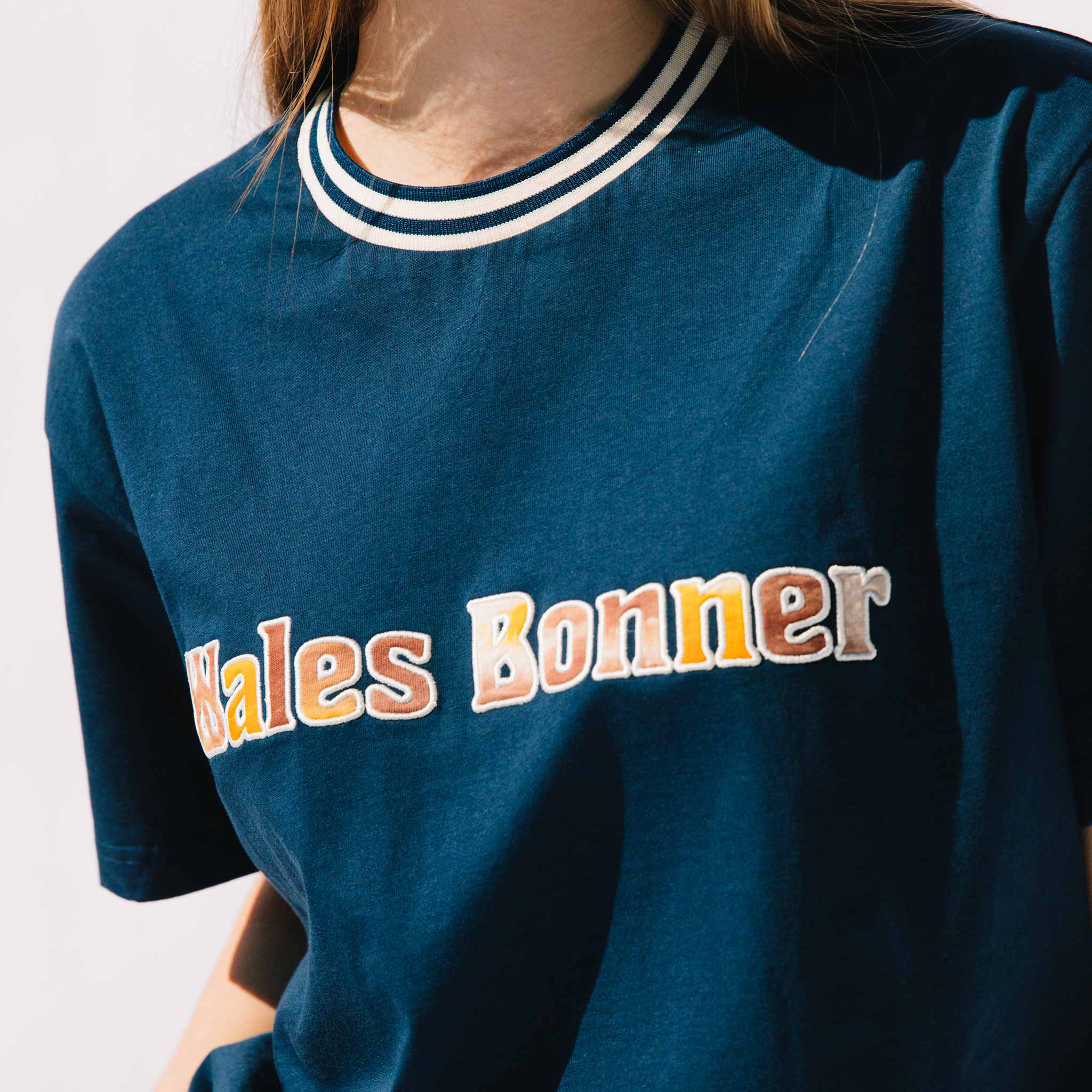 Close detail photo of model wearing the Original Tee - Navy.
