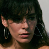 Jaclyn Moran Jewelry - Oversized Hoop & Post Earrings in Sterling Silver, pictured on model.